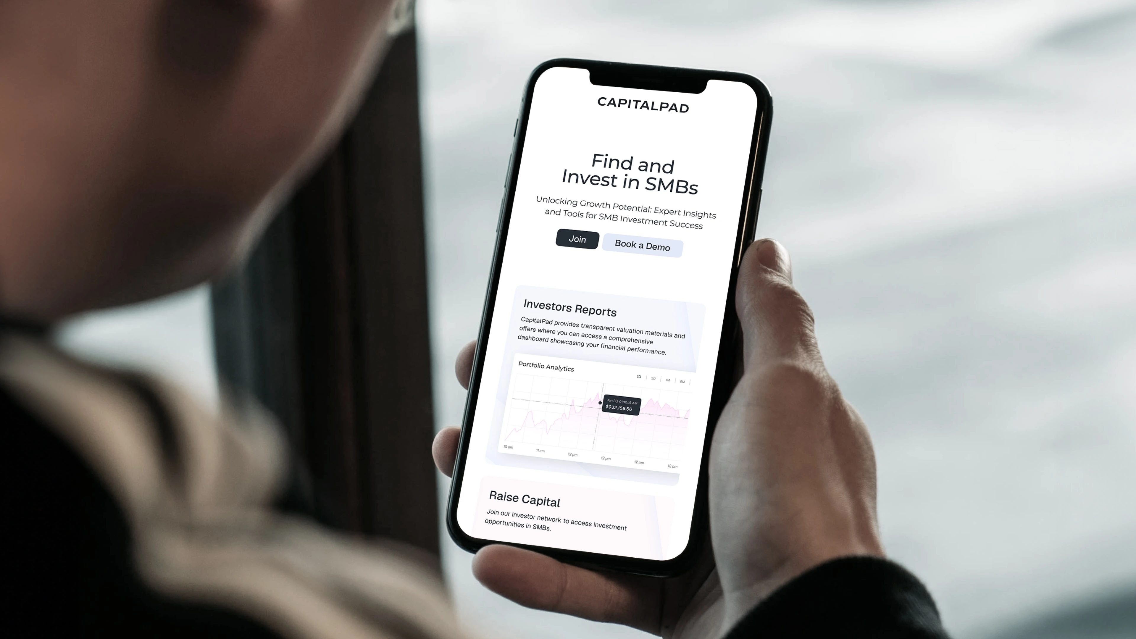 CapitalPad investment website shown on a phone