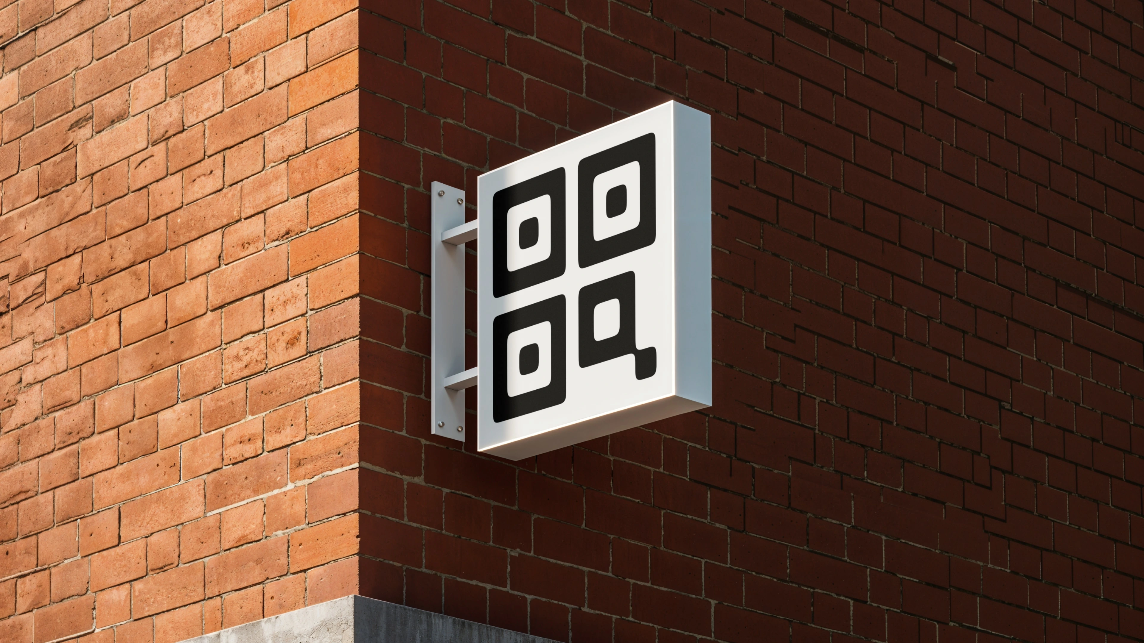 QR-Codes.com symbol used as an illuminated sign on a brick building
